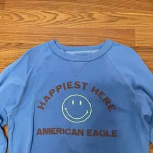 American Eagle Outfitters Blue Sweater with Brown and Yellow Print